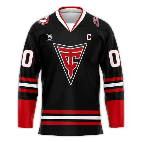 Front of the black Carolina Thunderbirds 2025-26 hockey jersey featuring the TCF crest, red and white stripes, and shoulder patches.