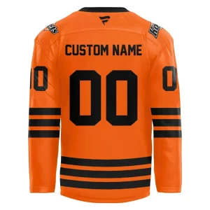 Back view of the orange Fort Wayne Komets 2025-26 jersey, showing the area for a custom name and number above the black stripes.