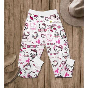 A close-up of the pajama pants with an all-over pattern of Hello Kitty, pink ribbons, and supportive phrases.