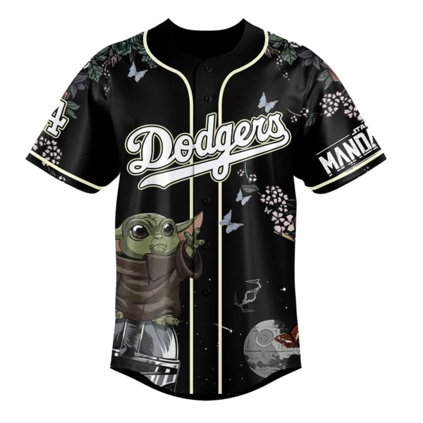 Front of the black Los Angeles Dodger baseball jersey with Grogu (Baby Yoda), floral patterns, and the Dodgers script logo.