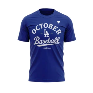 A close-up of the front of the royal blue LA Dodgers October Baseball 2025 shirt, showing the white script and Postseason logo.