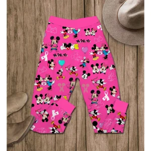 The pink pajama pants with an all-over print of Mickey and Minnie Mouse, hearts, and pink breast cancer awareness ribbons.