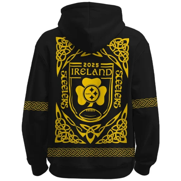 Back of the black Steelers hoodie featuring a large yellow Celtic-inspired crest with "2025 Ireland" and the Steelers logo.