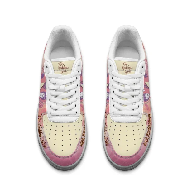 A top-down aerial view of the Golden Girls 40th Anniversary sneakers, showing the design on the toe box and tongues.