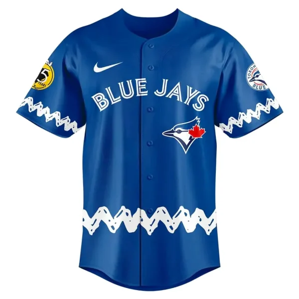 Front of the royal blue Toronto Blue Jays Peanuts Day jersey showing the team logo and white zigzag pattern.