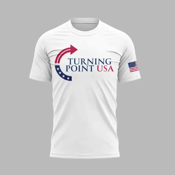 Front of the white Turning Point USA t-shirt showing the logo in red and blue with an American flag on the right sleeve.