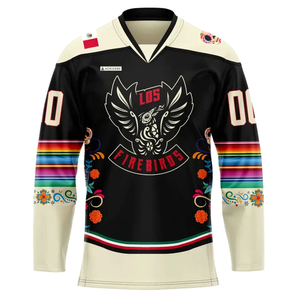 Front View Of The Coachella Valley Firebirds Dia De Los Muertos Jersey Front of the black Coachella Valley Firebirds Dia de Los Muertos jersey with the Los Firebirds logo and colorful floral sleeve design.