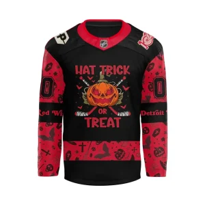 Front of the Detroit Red Wings Halloween jersey showing the "Hat Trick or Treat" pumpkin design and patterned sleeves.