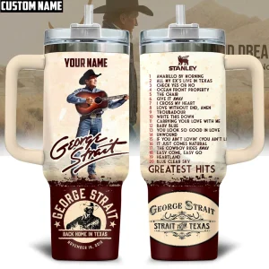 Front and back view of a custom George Strait Greatest Hits tumbler with a handle, showing his picture and a song tracklist.