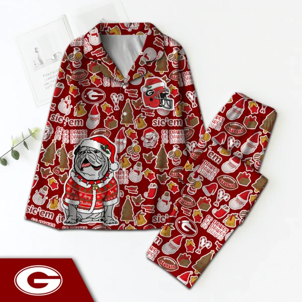 A red Georgia Bulldogs Christmas pajama set with a bulldog mascot, logos, and festive icons laid flat on a white surface.