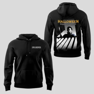 A black pullover hoodie for the John Carpenter 2025 tour. The back has a large graphic of Michael Myers from the movie Halloween.
