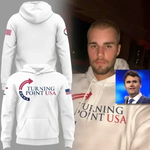 A collage showing Justin Bieber in a white Turning Point USA hoodie alongside front and back product mockups of the apparel.