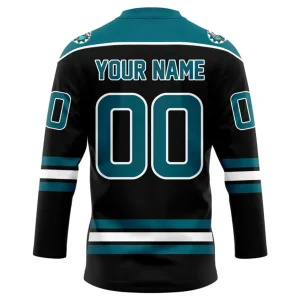 Back view of black jersey showing customizable "YOUR NAME" above large "00" in teal outlined in white, shoulder patch details, and coordinating teal and white striping on sleeves and hem.
