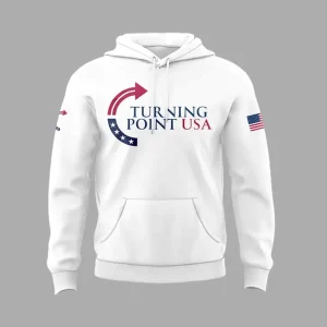 Front of the white pullover hoodie featuring the red and blue Turning Point USA logo and an American flag on the sleeve.